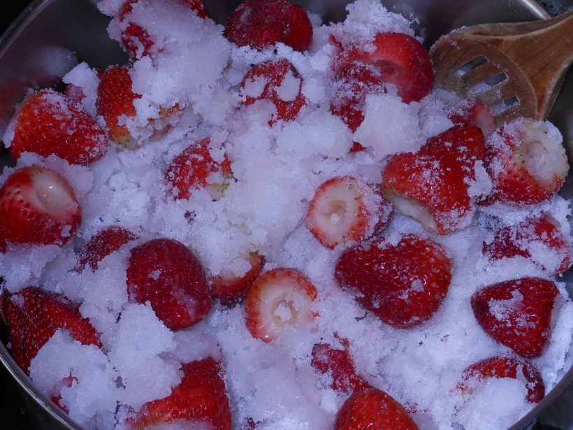 Strawberries layered with sugar.