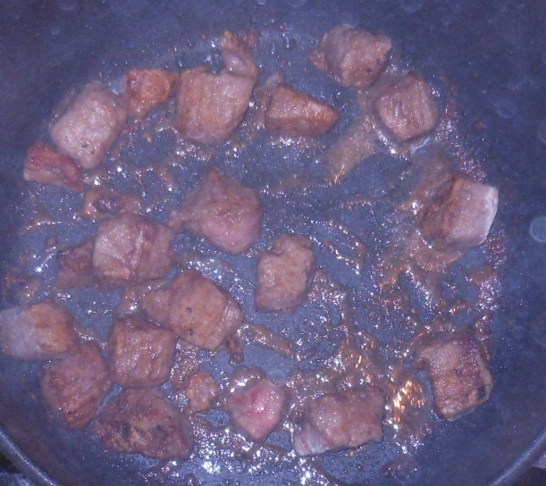 And I cooked the remaining meat.  See how the oil is started to turn a lovely brown shade and get a bit thick?  It's like I'm creating a roux (a combination of fat and flour) while I'm browning my meat.