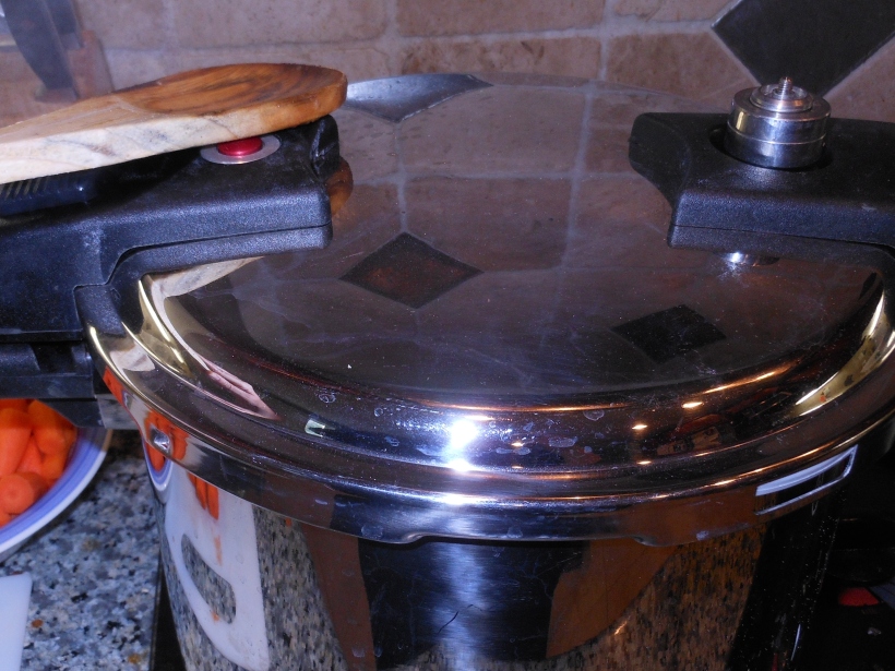 Once the timer went off, I used the pressure release valve to release the pressure within the cooker.  This allowed me to safely open it and add the veggies.