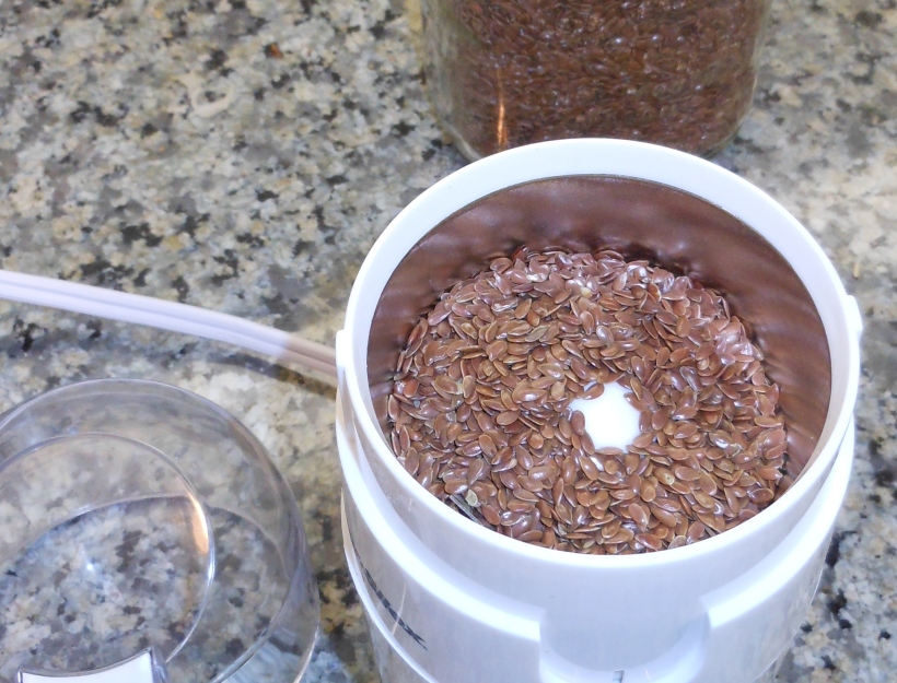 Before I started making the crackers, I ground my flax seed (2 T.) in a coffee grinder.