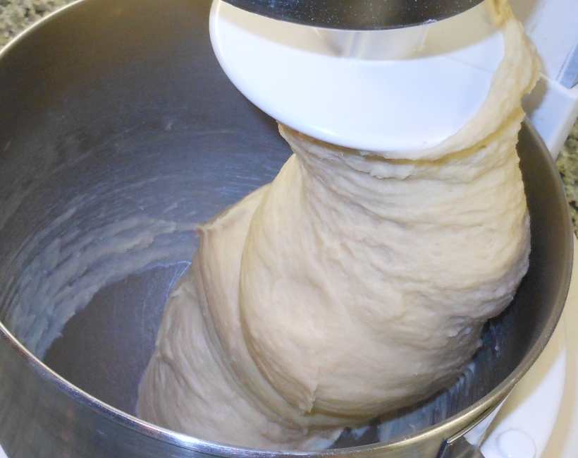 After kneading it for 5 minutes on medium speed, the dough is smooth and beautiful.  It springs back when you press into the dough.