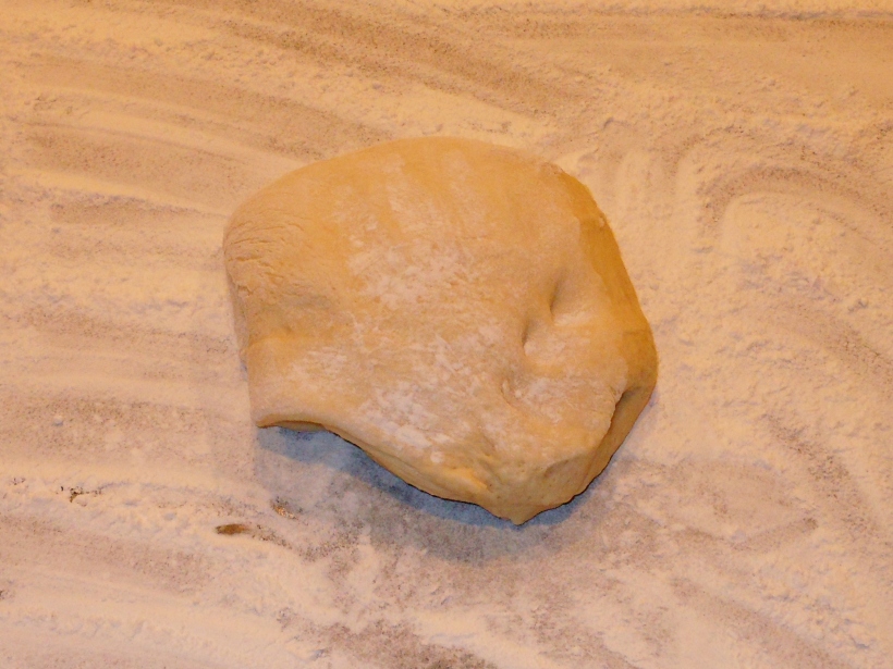 Divide the dough in half and put one half on your floured surface.  Turn it over so there's flour on both sides.