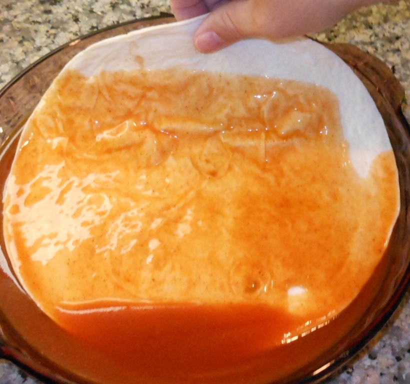 See?  It fits perfectly.  I dipped both sides of the tortilla, leaving the edge sauce-free to keep my hands cleaner.